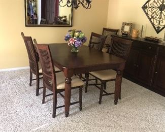 SOLID WOOD MCLAUGHLIN FURNITURE TABLE AND CHAIRS 
COMES WITH 3 LEAVES
64.5” L x 42” W x 30” H
