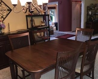 SOLID WOOD MCLAUGHLIN FURNITURE TABLE AND CHAIRS 
COMES WITH 3 LEAVES
64.5” L x 42” W x 30” H