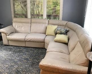 BEIGE NATUZZI LEATHER FROM GORMANS POWER RECLINER SECTIONAL 
LEFT SIDE 98” 
RIGHT SIDE 98”
HEIGHT 36”