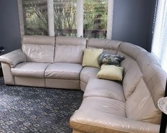 BEIGE NATUZZI LEATHER FROM GORMANS POWER RECLINER SECTIONAL 
LEFT SIDE 98” 
RIGHT SIDE 98”
HEIGHT 36”