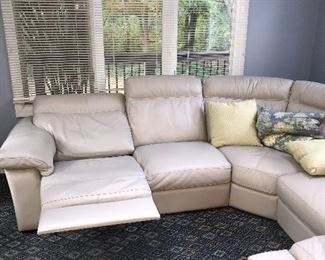 BEIGE NATUZZI LEATHER FROM GORMANS POWER RECLINER SECTIONAL 
LEFT SIDE 98” 
RIGHT SIDE 98”
HEIGHT 36”