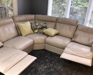 BEIGE NATUZZI LEATHER FROM GORMANS POWER RECLINER SECTIONAL 
LEFT SIDE 98” 
RIGHT SIDE 98”
HEIGHT 36”