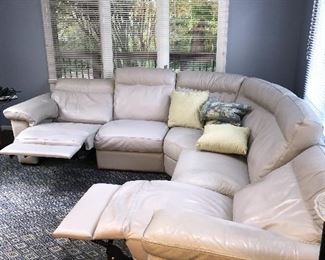 BEIGE NATUZZI LEATHER FROM GORMANS POWER RECLINER SECTIONAL 
LEFT SIDE 98” 
RIGHT SIDE 98”
HEIGHT 36”