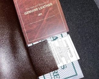 BROWN LEATHER SWIVEL CHAIR