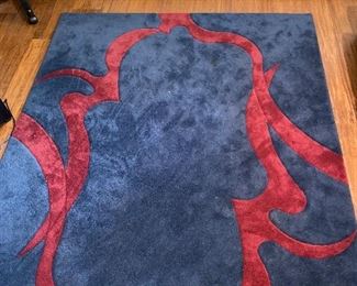 BLUE AND RED AREA RUG