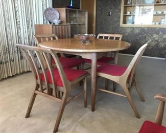MCM style Dining Suite - no brand name found. Chairs are in the style of John Van Koert . Solid Construction. Wood needs refinishing