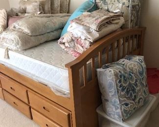 Twin bed with storage and bedding!
