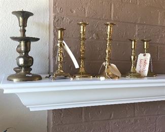 Antique brass candlesticks - some have pushups