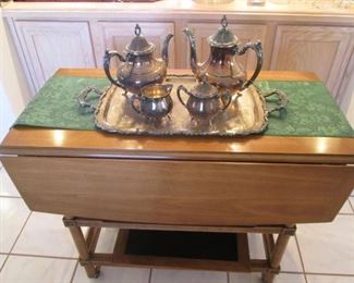 MCM Drop Leaf Serving Cart, 36" X 19", with 2-10" Drop Sides, displaying a Silver Plate Tea & Coffee Set