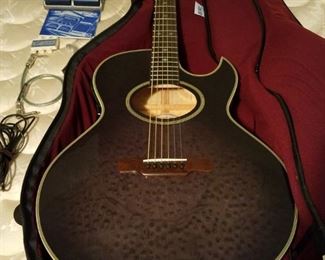 GIBSON Epiphone Electric Acoustic Guitar PR7E TBK. LIKE NEW! Serial #598050006. From the Presentation Series introduced in the late 1970s. This guitar is probably from the late 1990s. Transparent black finish. Includes case and accessories.