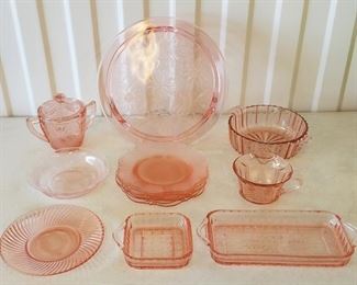 Pink Depression glass. Also have green in the auction.