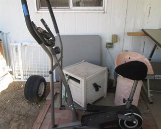 Exercycle, Garden Hose in Container, Bridge Table 