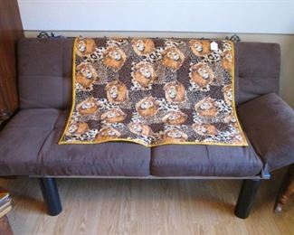 Futon + Fabric Wall Hanging on Metal Rod