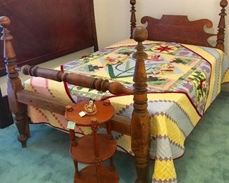 Antique rope bed converted to hold modern mattress set