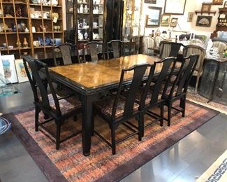 Hollywood Regency Black and Wood Dining Table with 2 leaves and 8 chairs
