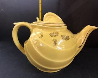yellow ceramic tea pot
