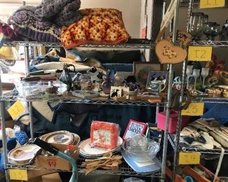 knit blankets, lunch box, mixing bowls, stuff related to cows, cools plates, purses, tiles, and more