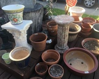 Lots of garden pots and accessories.