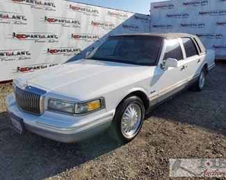 80: 1997 Lincoln Town Car, White Signature Package
Leather Interior, Sunroof, steering wheel controls, power windows, power seats, cold ac Year: 1997
Make: Lincoln
Model: Town Car
Vehicle Type: Passenger Car
Mileage: {ENTER MILEAGE HERE}
Plate: 5VWV742
Body Type: 4 Door Sedan
Trim Level: Signature
Drive Line: RWD
Engine Type: V8, 4.6L (281 CID); SOHC 16V; EFI
Fuel Type: Gasoline
Horsepower:
Transmission: Automatic
VIN #: 1LNLM82W1VY693795
Features and Notes: