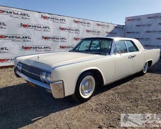 88: 1962 Lincoln Continental Sedan, White
Blue leather interior, Power windows, AC, Suicide Doors, Radioa, 1962 Lincoln continental Sedan, Mileage- 86922, Plate- SEZ286, Assembly Plant - Wixom, Michigan, Engine - N-430 CID V-8, 2V; K-430 CID V-8 Low compression