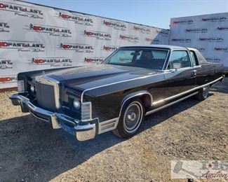 90: 1977 Lincoln Continental Town Coupé, Black
Power windows, Leather interior, glass roof, cassette Player, AC, 2nd row seating 1977 Lincoln Town Coupé, Black, Mileage - 42432, Plate - 948CLX, Ford V-8 351M/400"B" 400CID, Automatic Transmission