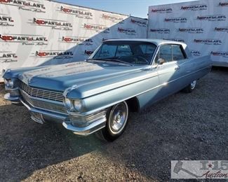 92: 1964 Cadillac Sedan DeVille, Blue
4 door, hard top, leather and cloth interior, low miles, power windows, radio, AC 1964 Cadillac Sedan DeVille, Blue, mileage - 3070, plate - , V-8, Automatic Trans