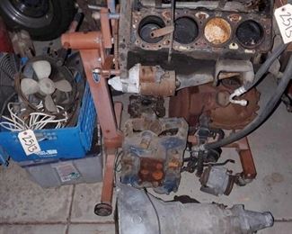 130:
Motor, Transmission, Motor Carry Cart, Various Parts
Two Hitch Recievers, Two Dolleys, Shop Cart and Oil Change Tray