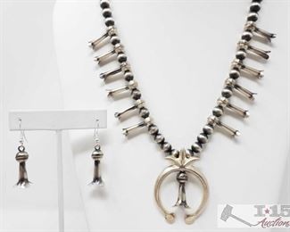 290:
Navajo Sterling Silver Squash Blossom Necklace And Earrings Set, 6.6g
This Navajo Sterling Silver handmade silver pearls and squash blossom set is simply stunning! The necklace measures to 22 inches in length. The earrings are 1 inch in length and 1/2 of an inch wide. This is a great set for any collection
Weighs approx 6.6g, necklace measures approx 22"