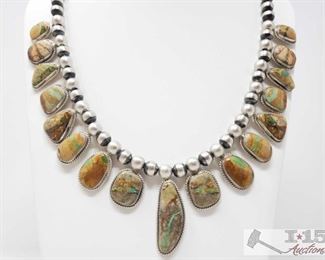 312:
Ribbon Turquoise And Sterling Silver Necklace
Sterling Silver Necklace weighs approx. 134.3g measures approx. 14"