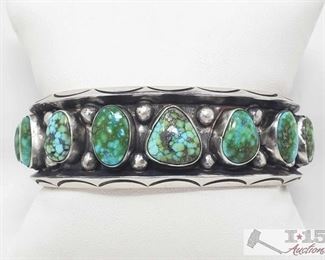 321:
Navajo Sterling Silver & Sonoran Gold Turquoise Cuff Bracelet Signed & Stamped
This wonderful cuff is made by a Navajo artist. This piece has incredible work. It is made of Sterling Silver & Sonoran Gold Turquoise. The cuff is 1 inch wide and the inside circumference is 5 1/2 inches with a gap of 1 1/4 inches. This piece is Stamped Sterling And signed by the artist.
Weighs approx 75.3g