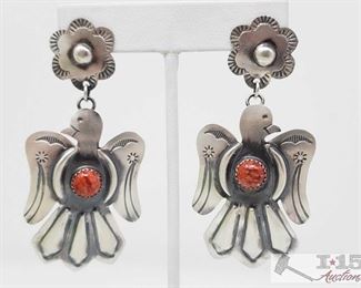 327:
Tim Yazzie Navajo Spiny Oyster And Sterling Silver Thunderbird Dangles, 17.4g
These are a pair of Tim Yazzie Navajo Spiny Oyster And Sterling Silver Thunderbird Dangles. They are right at 2 3/4 inches long and 1 1/4 inches wide. Combined weigh approx 17.4g