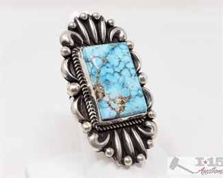 337:
Vintage Water web Kingman Turquoise Bump Out Ring, 22.5g
Sterling Silver | Genuine Water web Kingman Turquoise | Vintage Water web Kingman Turquoise Bump Out Ring | Navajo Native American Southwest Indian Jewelry | Dimensions: 2" face width, .5" x 1" stone | Signed: A Jake Weighs approx 22.5g, approx size 7
Metal Type: Sterling Silver
Gemstones: Turquoise
Low Estimate: 400
High Estimate: 600