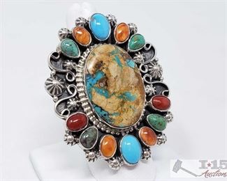 341:
Kathleen Chavez Multi Color Cluster Sterling Silver Ring, 29.3g
Sterling Silver | Genuine Royston Turquoise, Multiple Color Spiny Oyster & Coral | Kathleen Chavez Multi Color Cluster Ring | Navajo Native American Southwest Indian Jewelry | Dimensions: 2" face width, .75" x 1" center stone | Signed: Kathleen Weighs approx 29.3g, approx size 7.5
Metal Type: Sterling Silver
Low Estimate: 400
High Estimate: 600