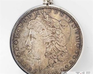 401:
Morgan Silver Dollar weighs approx 29.5g
New Orleans Mint