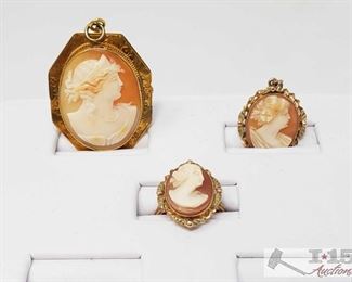 500: 14k Gold Brouche, Pendant and Ring
14k Gold Brouche, Pendant and Ring weaighs approx 12.8g ring size approx 4.5