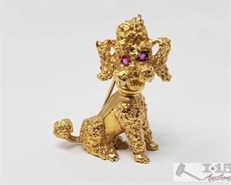 502:
14k Gold Dog Brouche
14k Gold Dog Brouche weighs approx 8.3g