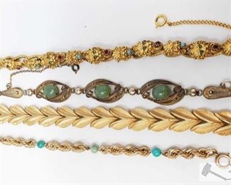 702:
Trifari Bracelet, Florenza Bracelet with Jewels, Sorrento Bracelet and a 12k Gold Filled Bracelet
Trifari Bracelet, Florenza Bracelet with Jewels, Sorrento Bracelet and a 12k Gold Filled Bracelet measures approx from 7" to 8" weighs approx 79.5g