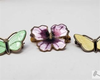 752:
Sterling Silver Butterfly and Flower Broaches
Sterling Silver Butterfly and Flower Broaches 9.7g