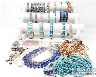 757:
Miscellaneous Jewlery and iPhone charging doc
Here’s a gorgeous mixed lot of colorful jewelry, mostly beaded or painted bracelets in beautiful colors. Gold, silver, and rhinestone costume pieces are also included. A nice little set of wardrobe accessories including an iPhone charging dock!