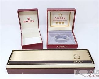 805:
Two Omega Watch Boxes and a Rolex Box
Two Omega Watch Boxes and a Rolex Box
