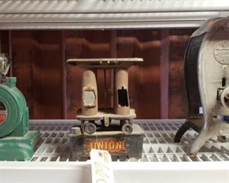6600:
Antique Monarch dial a pricer, Union heater, and Lawson water heater
SUPER COLLECTORS LOT!! LOOK AT THIS!!
* an antique Monarch 20 “dial-a-pricer” which is a hand-cranked metal machine for making price labels. Invented by Kohnle at the turn of the century, it was used for a number of years as one of the first hand-pricing machines for retailers.
* an 1885 Union Gardner MA cast iron double sad iron kerosene heater, camp stove, burner. One front plate cover is missing.
* an AWESOME antique Lawson water room heater cast iron in great condition.