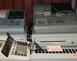 6616: 3 cash registers
Shown here are two cash registers with keys, and a professional desk calculator.
Larger cash register is a Royal alpha 9155C series cash register with 16 character name or description, tax table look ups, 1600 price check look ups, heavy duty alpha numeric 2-station printer with bar code scanner and PLU set up programming. Connects of PC to work with business software.
The smaller cash register marked 319 is a Sharp model XE-A102 electronic machine small in size but high performance, simple to use, easy to program, efficient with large 14-mm display, high contrast LED screen, eight departments, four clerk numbers, auto tax system, flash report. Locking. Accepts 2.25” paper rolls.
A Canon electronic calculator with red and black ribbon