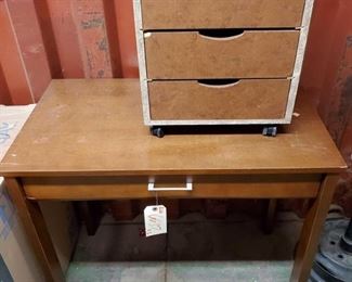 6637:
Desk and Rolling Mini Storage Cabinet
Featured in this lot are two office items – a wooden thin line single drawer desk and a rolling 3-drawer cabinet, woodgrain drawers.
