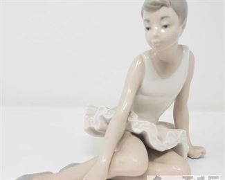 8502:
Nao by Lladro "Seated Ballet" Figurine
Lladro Nao porcelain “Seated Ballet is a beautiful Spanish piece, hand painted in glossy, natural tones. This figurine is part of the Nao Dance Collection which features numerous collectible ballet figurines all handmade by Lladro artisans. Measures approx 6.25".
