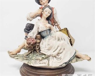 8503:
Guiseppe Armani Capodimonte style Figurine
Still has authenticity tags and historical data of artists origin. This figurine is done in Capodimonte style porcelain (1743-1759) by Guiseppe Armani made at an early Italian porcelain factory famous for making molded figurines from soft paste and covered with beautiful lustrous glaze. Measures approx 10" tall