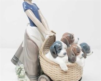 8504:
Lladro "Litter of Fun" Girl Pushing Puppies Figurine
Here is Lladro’s retired “Litter of Fun” figurine #5364 (1986-2000) is an adorable fine porcelain figurine of a little girl pushing a stroller basket of puppies. Measures approx 8.5"
Low Estimate: 180
High Estimate: 250