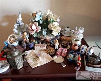8520:
Assorted Figurines, Souvenirs, and More
SOOO MANY COOL THINGS!!!
*a tiny pewter tea pot, a teak wooden tea pot
*JC Penney discount ornament
*several tiny ceramic Asian vases, tiny tea pots, tiny little trinkets
*delicate fine porcelain figurines
*hand sewn applique dinner cloths
*Dutch wooden and ceramic shoes
*handheld mirror
*authentic Asian porcelain jewel boxes
*Lenox ceramic bouquet