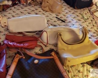 8715:
7 Various Handbags
Seven ladies purses are shown here, some are handbags with tote handles and others have shoulder straps. This lot has a nice variety of colors and types, from smaller to larger bags. 7 Various Handbags