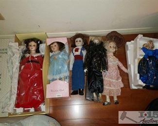 8902: 6 Porcelain Dolls, Seymour Mann, Barbie Blue Rhapsody 1986, and Others
COLLECTIBLE PORCELAIN DOLL!
A vintage Connoisseur Collection Doll “Christmas Scarlett” #Bx788 by Seymour Mann. Doll is fully sealed in plastic and in mint condition.
A vintage (1990’s) porcelain doll #17003 new in box
Three other porcelain dolls
A Barbie Blue Rhapsody (1986) Limited Edition