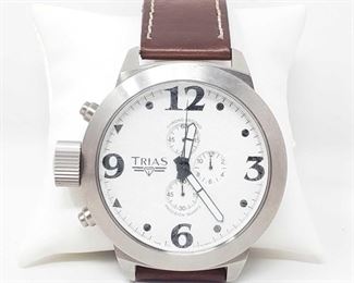 818:
Trias Wrist Watch
Trias Wrist Watch measures approx 55mm. Does tick.